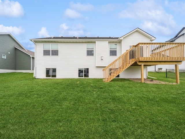 645 NW Prairie Rose Ln, Waukee, IA 50263 - rear view of house featuring a deck, stairs, and a yard