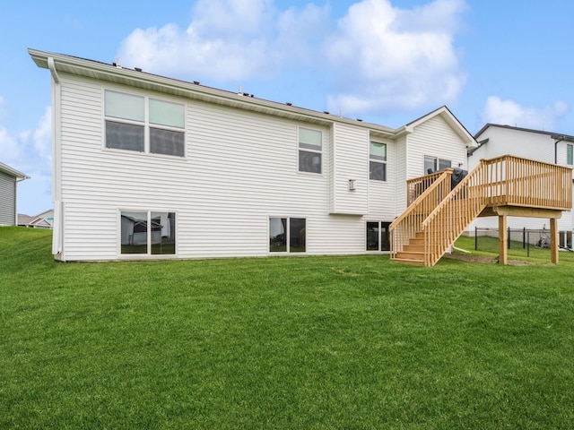 645 NW Prairie Rose Ln, Waukee, IA 50263 - back of property with stairway and a deck