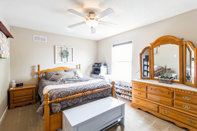 276 NW Georgetown Blvd, Ankeny, IA 50023 - bedroom featuring light colored carpet and ceiling fan