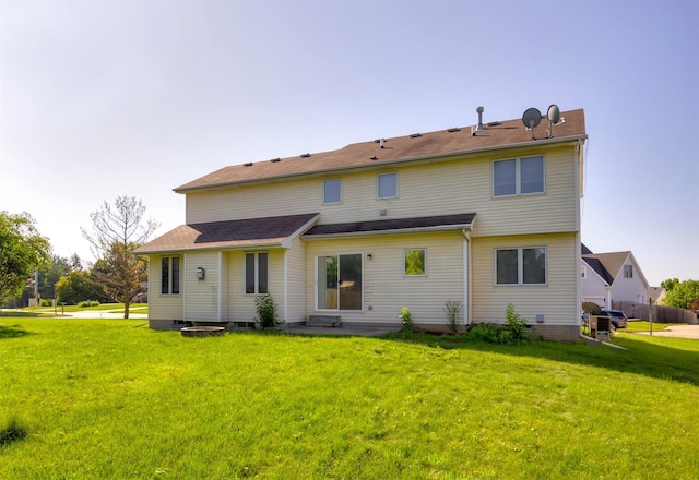 7523 Aspen Dr, West Des Moines, IA 50266 - rear view of house with a lawn