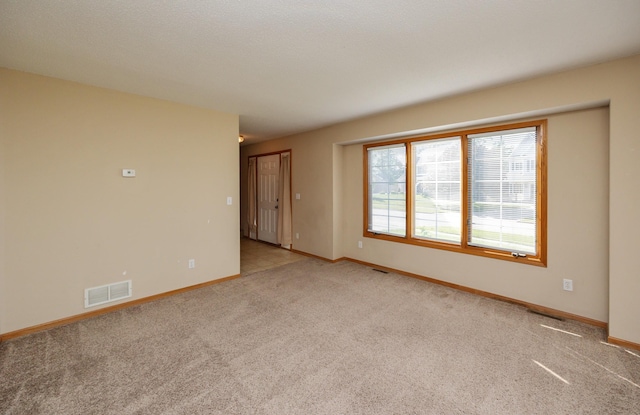 7523 Aspen Dr, West Des Moines, IA 50266 - unfurnished room featuring carpet flooring and baseboards