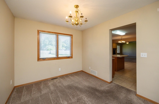 7523 Aspen Dr, West Des Moines, IA 50266 - carpeted spare room with a chandelier and baseboards
