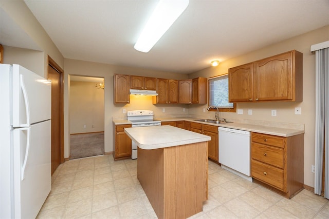 7523 Aspen Dr, West Des Moines, IA 50266 - kitchen with white appliances, light countertops, under cabinet range hood, and light flooring