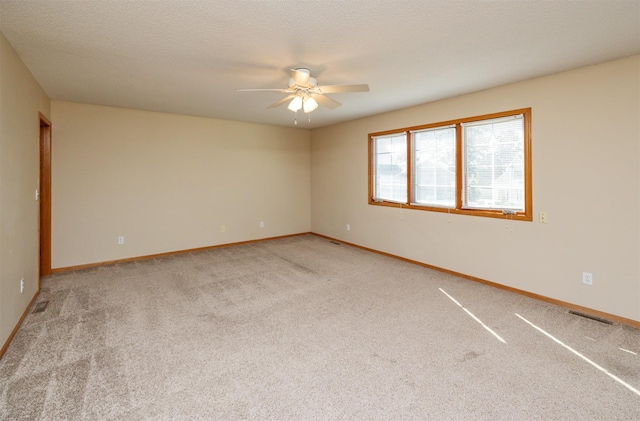 7523 Aspen Dr, West Des Moines, IA 50266 - empty room featuring ceiling fan and light colored carpet