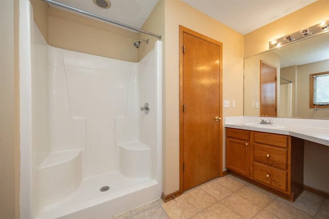 7523 Aspen Dr, West Des Moines, IA 50266 - bathroom with vanity and a shower
