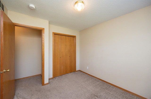 7523 Aspen Dr, West Des Moines, IA 50266 - unfurnished bedroom featuring light carpet and a closet