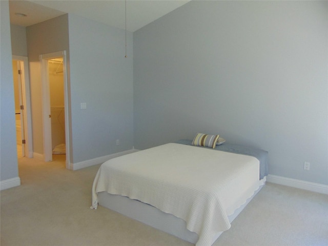 8114 Cobblestone Ct, Urbandale, IA 50322 - bedroom featuring light carpet and baseboards