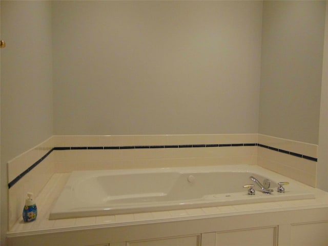 8114 Cobblestone Ct, Urbandale, IA 50322 - bathroom featuring a garden tub