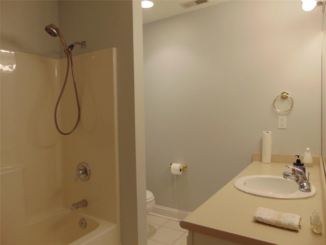 8114 Cobblestone Ct, Urbandale, IA 50322 - bathroom featuring tile patterned floors, vanity, and shower / tub combination