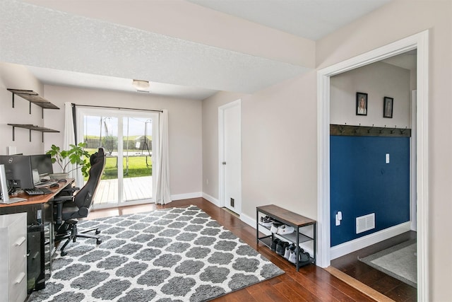 2207 Vista View Dr, Granger, IA 50109 - home office featuring hardwood / wood-style flooring and baseboards