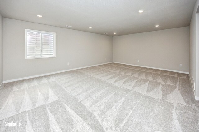9756 Regatta Ln, Johnston, IA 50131 - empty room with light carpet and recessed lighting