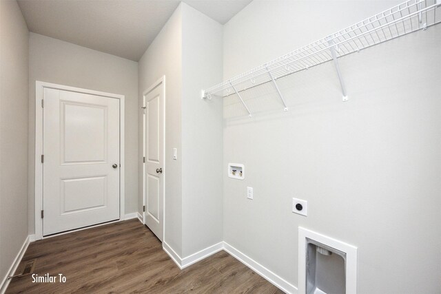 9764 Regatta Ln, Johnston, IA 50131 - laundry area with electric dryer hookup, hookup for a washing machine, and dark wood-type flooring