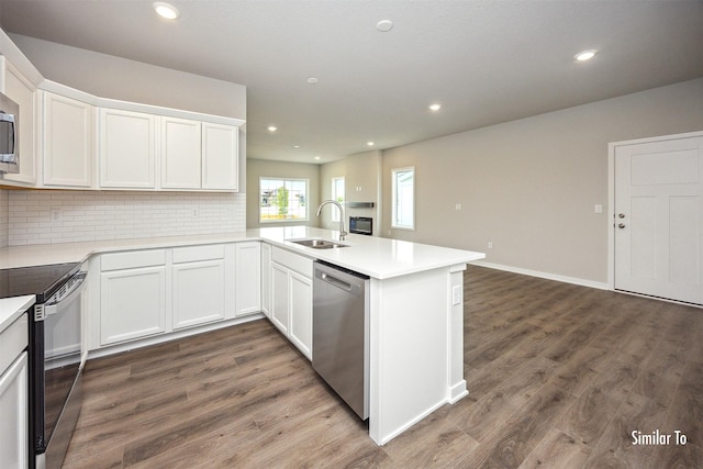 9764 Regatta Ln, Johnston, IA 50131 - kitchen featuring stainless steel appliances, dark wood-style flooring, backsplash, white cabinets, and recessed lighting