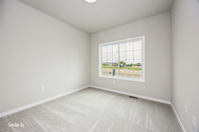 9764 Regatta Ln, Johnston, IA 50131 - spare room with carpet floors
