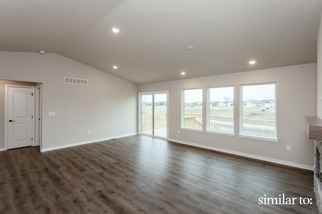9383 Modena Ln, West Des Moines, IA 50266 - spare room featuring vaulted ceiling, dark wood-style flooring, and recessed lighting