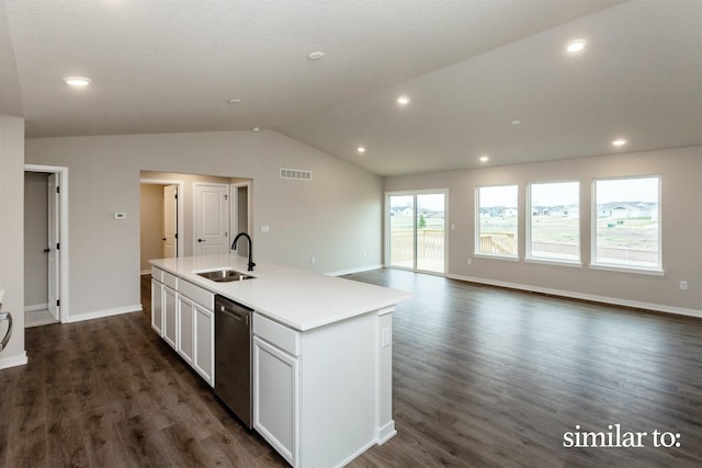 9383 Modena Ln, West Des Moines, IA 50266 - kitchen with stainless steel dishwasher, lofted ceiling, dark wood-type flooring, a center island with sink, and white cabinetry