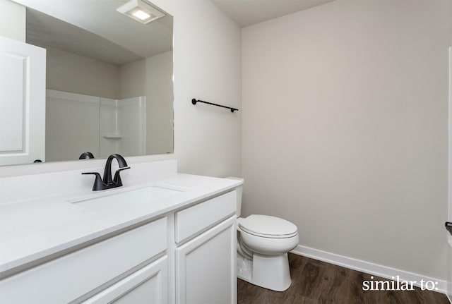 9383 Modena Ln, West Des Moines, IA 50266 - full bath featuring vanity, wood finished floors, and a shower