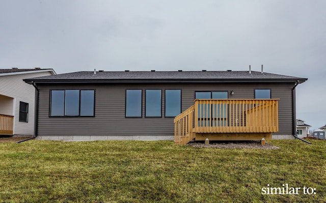 9383 Modena Ln, West Des Moines, IA 50266 - back of property with a deck and a lawn