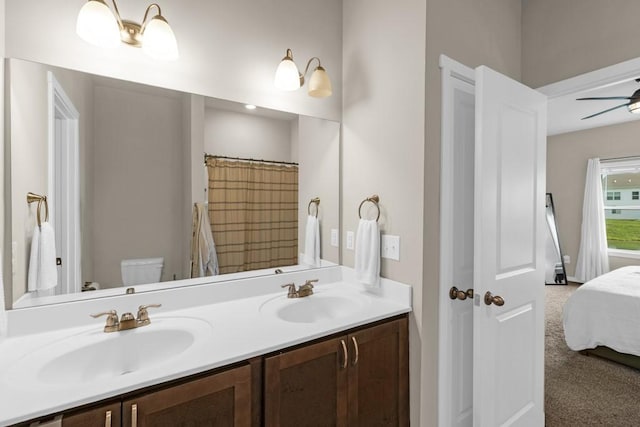 210 SE Willow Run Ln, Ankeny, IA 50021 - ensuite bathroom featuring double vanity and a ceiling fan