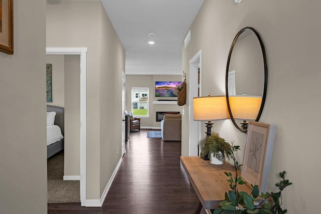 210 SE Willow Run Ln, Ankeny, IA 50021 - hallway with dark wood-style floors and recessed lighting
