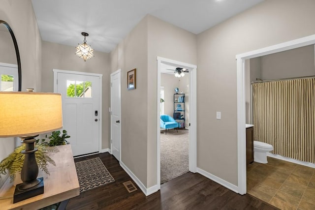 210 SE Willow Run Ln, Ankeny, IA 50021 - entrance foyer with a ceiling fan and wood finished floors