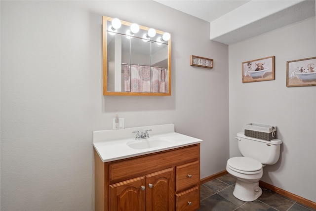 602 8th St, Malcom, IA 50157 - full bath featuring vanity and toilet