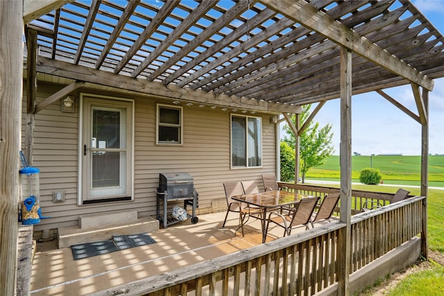 602 8th St, Malcom, IA 50157 - wooden deck featuring a pergola, grilling area, and view of golf course