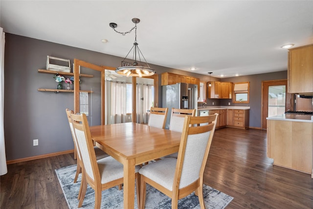 602 8th St, Malcom, IA 50157 - dining space featuring dark wood-type flooring, a chandelier, and recessed lighting