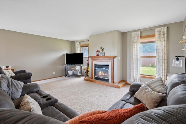 602 8th St, Malcom, IA 50157 - living room with carpet flooring and a glass covered fireplace