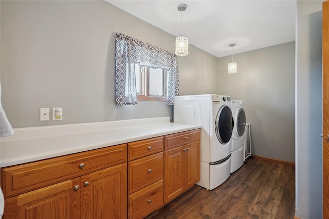 602 8th St, Malcom, IA 50157 - washroom with washer and clothes dryer and dark wood-type flooring