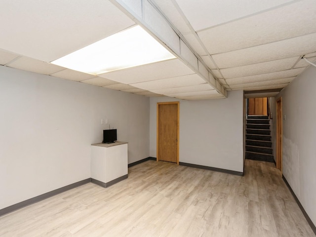 904 52nd St, West Des Moines, IA 50265 - finished basement featuring light wood finished floors, stairs, and a drop ceiling