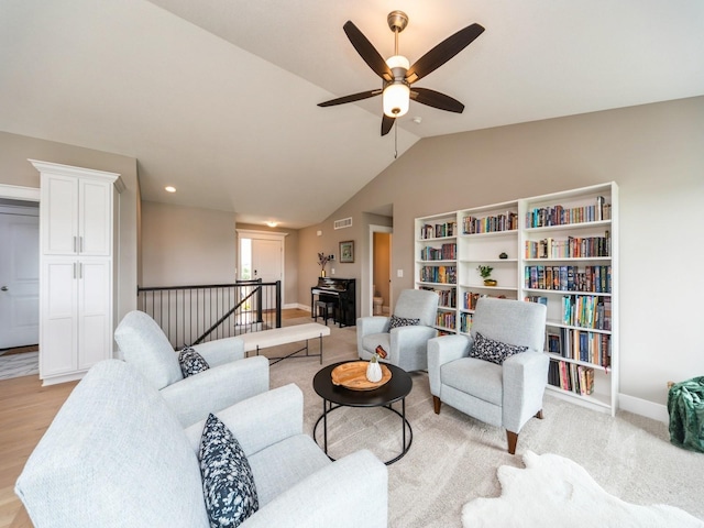 712 Mallard Pointe Dr NW, Bondurant, IA 50035 - living area featuring vaulted ceiling and a ceiling fan