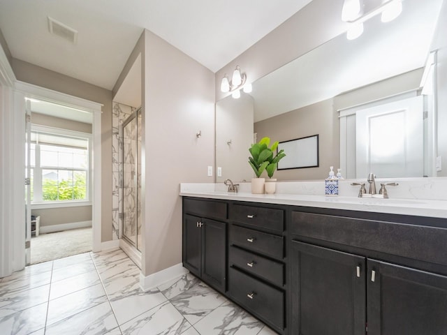 712 Mallard Pointe Dr NW, Bondurant, IA 50035 - bathroom with marble look tiles, double vanity, and a shower stall