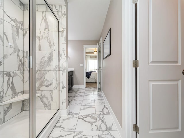 712 Mallard Pointe Dr NW, Bondurant, IA 50035 - hallway with light marble finish flooring and baseboards