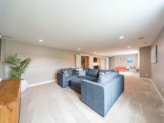712 Mallard Pointe Dr NW, Bondurant, IA 50035 - living area with light colored carpet and recessed lighting