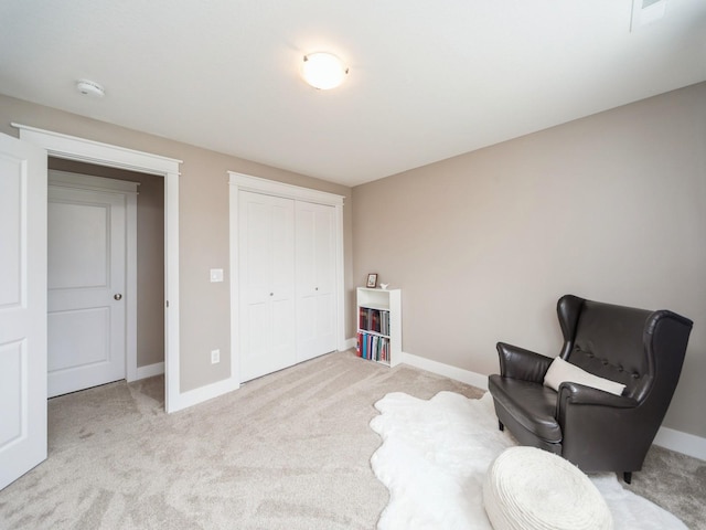 712 Mallard Pointe Dr NW, Bondurant, IA 50035 - sitting room featuring light carpet