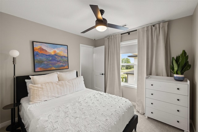 9622 NW 70th Ave, Johnston, IA 50131 - bedroom with light colored carpet and ceiling fan
