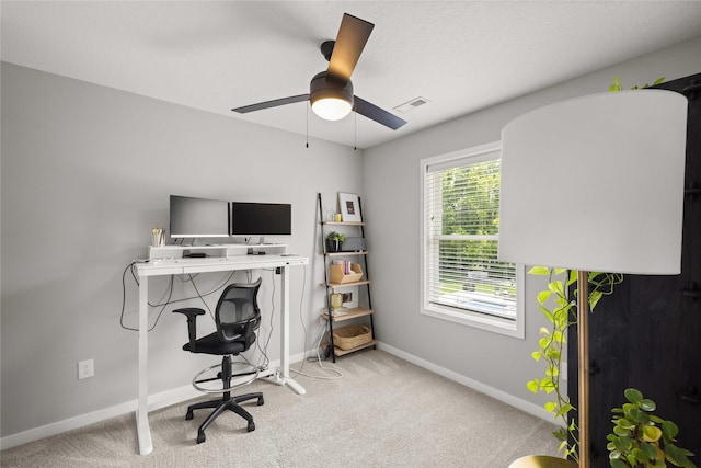 9622 NW 70th Ave, Johnston, IA 50131 - carpeted office space featuring baseboards and a ceiling fan