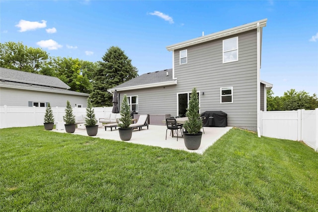 9622 NW 70th Ave, Johnston, IA 50131 - rear view of house with a fenced backyard and a patio area