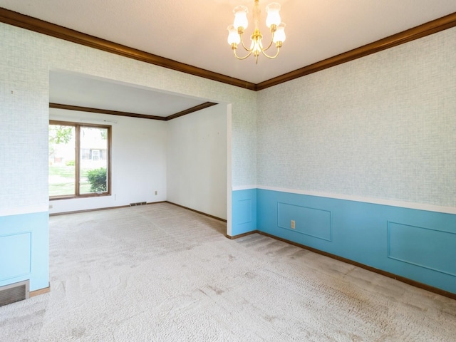 2100 Meadow Brook Dr, West Des Moines, IA 50265 - unfurnished room featuring ornamental molding, a chandelier, wainscoting, and carpet floors