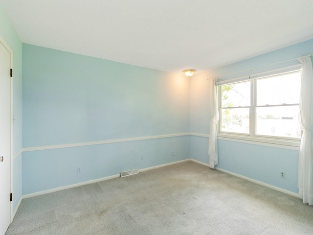 2100 Meadow Brook Dr, West Des Moines, IA 50265 - unfurnished room with carpet floors and baseboards