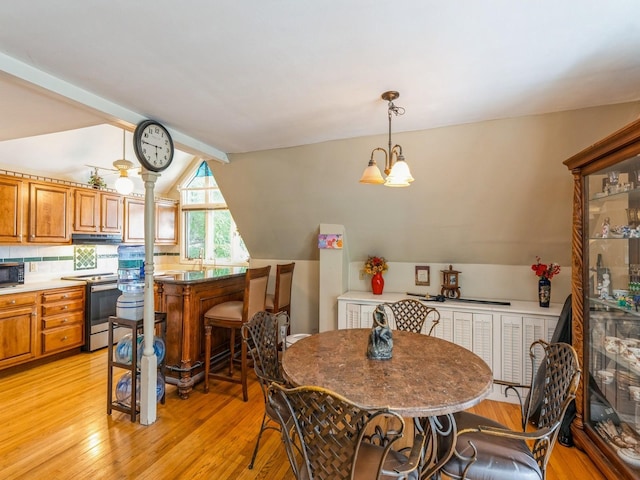 110 E 20th St N, Newton, IA 50208 - dining area with light wood finished floors