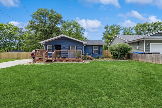 220 E Lally St, Des Moines, IA 50315 - ranch-style house with a deck