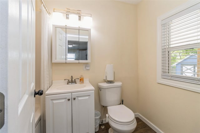 220 E Lally St, Des Moines, IA 50315 - bathroom with vanity and toilet