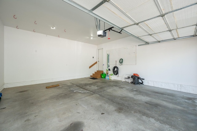 5514 SE 24th St, Des Moines, IA 50320 - garage featuring a garage door opener