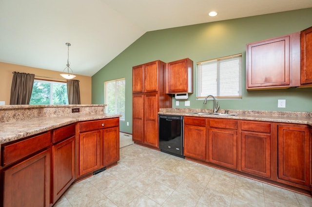 5514 SE 24th St, Des Moines, IA 50320 - kitchen with black dishwasher, lofted ceiling, light countertops, decorative light fixtures, and brown cabinetry