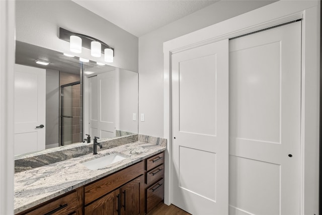 1217 NW Morningside Ct, Grimes, IA 50111 - bathroom with vanity and a stall shower