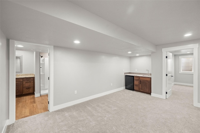 1217 NW Morningside Ct, Grimes, IA 50111 - finished basement featuring light colored carpet, wet bar, and recessed lighting