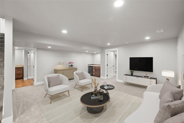 1217 NW Morningside Ct, Grimes, IA 50111 - living room featuring bar with sink, light carpet, recessed lighting, and stairs