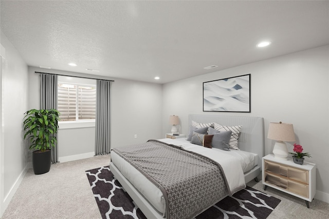 1217 NW Morningside Ct, Grimes, IA 50111 - carpeted bedroom with recessed lighting